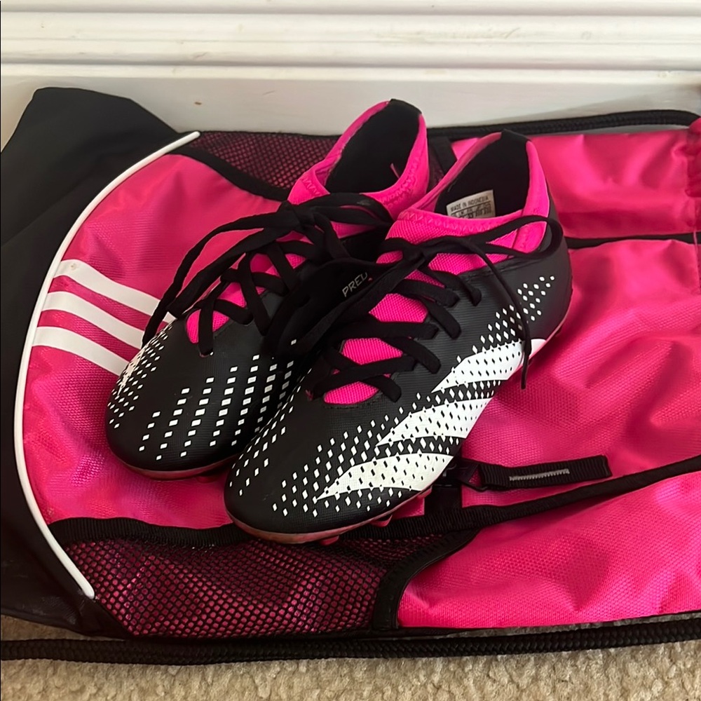 Girls Adidas Black and Pink soccer cleat’s - bag included.